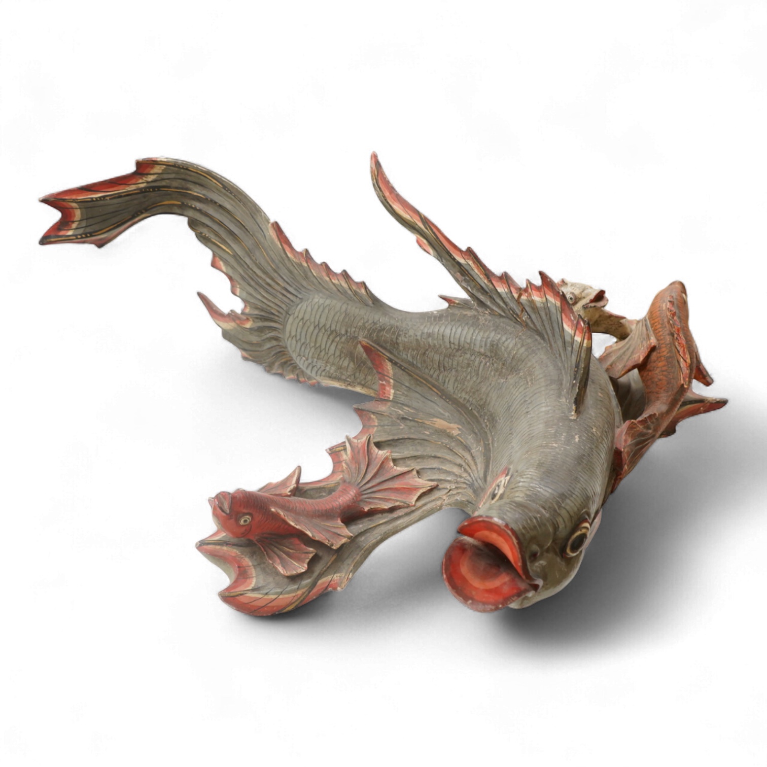 A large carved and painted wood hanging fish